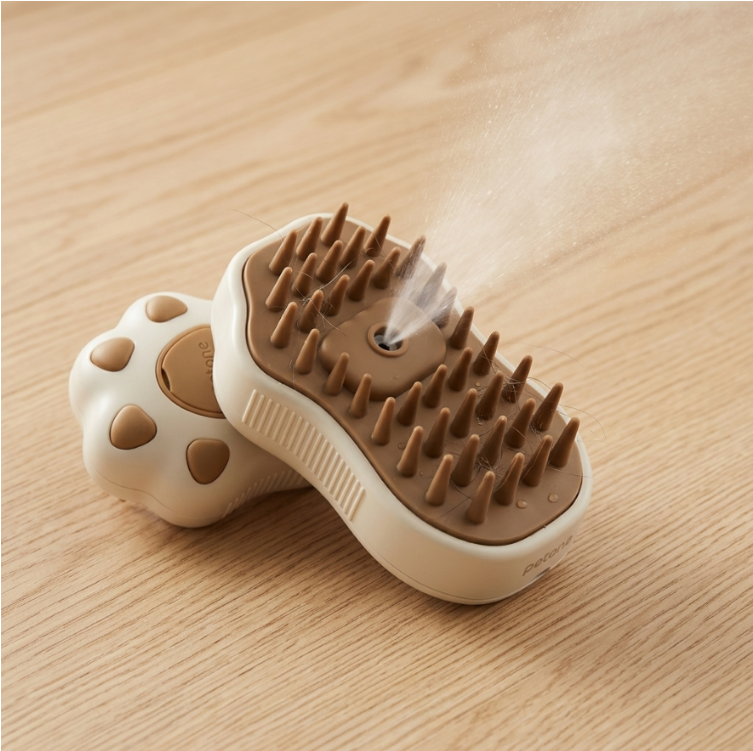 Electric steam grooming brush being used on a long-haired cat
